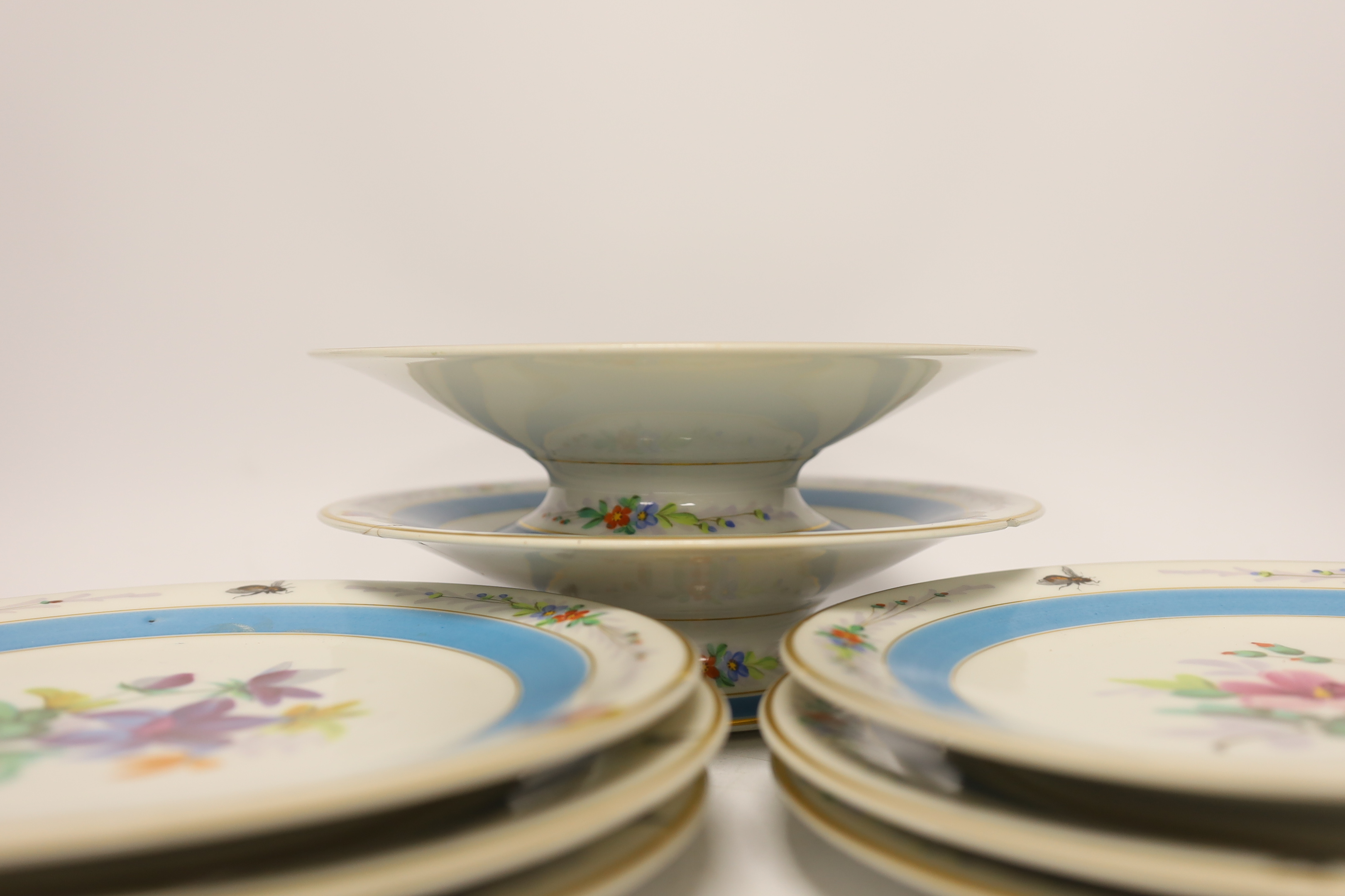 A French mid 19th century floral dessert set, with six plates and two pedestal dishes